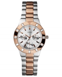 Covered in warm shine, this two-tone watch from GUESS glistens with crystal accents.