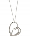 Show your heart's in the right place. T Tahari's pendant necklace, part of the Essentials Collection, is crafted from silver-tone mixed metal. Approximate length: 32 inches + 3-inch extender. Approximate drop: 3-1/4 inches.