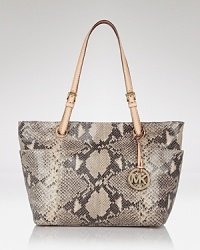 Give your look a luxe, exotic finish with this python-embossed leather tote from the master of chic: MICHAEL Michael Kors.