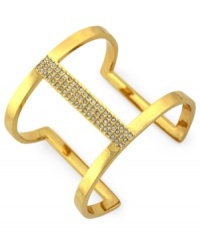 Airy elegance. Vince Camuto's cut-out cuff bracelet is crafted from gold-tone mixed metal with glass crystal accents adding a lustrous touch to the eclectic piece. Approximate diameter: 3-1/2 inches.