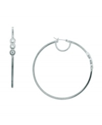 Subtle sparkle that catches the eye. These hoop earrings from Vince Camuto are embellished with shimmering crystal stones. Crafted in rhodium-plated mixed metal. Approximate diameter: 2-1/2 inch.