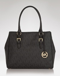 The latest must-have tote from MICHAEL Michael Kors, featuring a go-with-everything (and hold-it-all) design. It is definitely a piece that will stand the test of time.