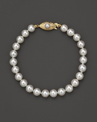 A simple strand of cultured pearls is essential classic design.