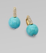 Smooth balls of bold turquoise accented with rhinestone encrusted hinged posts. TurquoiseGlass stonesGoldtone steelLength, about ¾Hinge-and-post backImported 