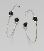 A sleek and modern piece with smooth black agate set in sterling silver. Black agateSterling silverLength, about 1¾Post backImported 