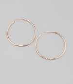 Slender hammered hoops of sterling silver and 18k gold, finished in the warm glow of 18k rose goldplating. An alloy of 18K gold and sterling silver plated with 18K rose gold Diameter, about 1¾ Post back Imported