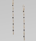 A delicate style consisting of beautiful rough black diamonds and radiant 14k gold beads. Rough black diamonds14k goldDrop, about 3French hookMade in USA 