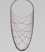 From the Art Deco Collection. A delicate but powerful web of crisscrossed chains edged by bold rectangular beads evokes a femme fatale look from the golden age of Hollywood.Hand-stained copperLength, about 17¾Lobster claspMade in USA