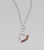 From the Bamboo Collection. A study in contrasts with this sterling silver and bamboo heart pendant on a rolo chain. Sterling silver Lenth, about 42 Pendant width, about 2 Lobster clasp closure Made in Italy 