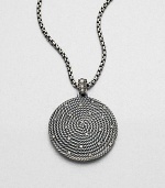 From the Cable Coil Collection. Brilliant diamonds sprinkled over a coiled cable design. Sterling silverDiamonds, .37 tcwPendant size, about 1.33Fixed baleImported Please note: Chain sold separately. 