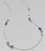 From the Elements Collection. A delicate, sterling silver chain link with smooth blue chalcedony, aquamarine, moon quartz and and multi-textural sterling silver beads in a clustered station design. Blue chalcedony, aquamarine, moon quartz Sterling silverLength, about 40Lobster clasp closureImported 