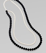 From the Night Blue Collection. This high contrast piece features strands of flocked velvet beads and pearlized glass beads. Length, about 45½ Slip-on style Imported 