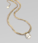 A single white baroque pearl hangs gracefully from delicate chains of 18k rose and yellow gold vermeil, and sterling silver. 16mm white organic man-made pearl Length, about 16 with 2 extender Lobster clasp Made in Spain