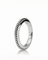 This stackable sterling silver ring from PANDORA bears a tribal-inspired patterned texture.