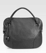 Sumptuous Vitello safari leather crafted in a uniquely-shaped hobo silhouette that's both sleek and rounded.Double top handles, 3½ dropTop zip closureProtective metal feetOne inside zip pocketTwo inside open pocketsFully lined16½W X 12H X 5½DMade in Italy