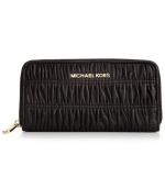 Before your next continental excursion, be sure to pack this pleated design from MICHAEL Michael Kors that provides plenty of pockets and compartments for cash, cards, coins and ID, while signature hardware gives the look luxe appeal.