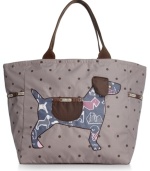 Dog gone it. Shoulder this picture perfect tote from LeSportsac, featuring a cute canine. Spot splashed with pockets aplenty, it's just right for jaunts to the gym or weekends away.