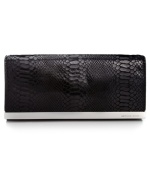 Organization with elegance. Chic python-embossed leather and gleaming signature hardware offer instant appeal to this MICHAEL Michael Kors design that discretely transforms from a shoulder bag to a clutch in a wink. The superbly organized interior is aligned with plenty of compartments for cash, cards, ID and lip gloss.