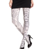 Revel in the reptilian rave with these python print tights from HUE. Luxuriously opaque and decidedly eye-catching, they add a pop of playful style to day or evening attire.