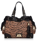 Take on the exotic trend with this tiger-print tote from Juicy Couture. Featuring luxe leather handles, golden stud accents and flirty side bows, it's easy to see why this look is so purr-fect.