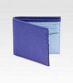 Two-tone design enhances this classic billfold wallet with two pocket sleeves and lends a vibrant, sporty feel.One billfold compartmentSix card slotsLeather4 x 4Imported