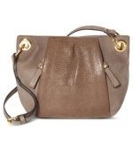 City-sleek with a go-anywhere attitude, this chic silhouette from Vince Camuto will carry you from deskside to dinner date with ease. Supple leather is accented with luxe golden hardware, while plenty of pockets inside and out keep every it-girl exquisitely organized.