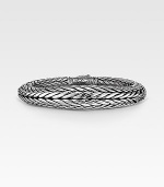 Sleek and stunning wristwear is handwoven in polished sterling silver. Pairs ideally with a suit or a tee. Signature dual-locking clasp About 8½ long Made in USA