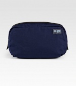 A classic toiletries bag in durable nylon canvas and rich seasonal colors.Zip-around closureExterior slit pocketInterior zip pocket10W X 6H X 4DNylonImported