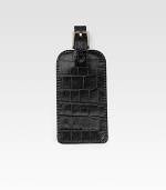 An elegant travel essential is handmade in croco-textured leather. Buckle closure 6¼ X 2½ Made in USA