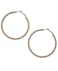 This time with feeling. INC International Concepts' large hoop earrings, crafted from gold-tone mixed metal, are textured to give them a different stylish sensation. Approximate diameter: 2-1/4 inches.