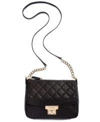 Elegant and understated, this luxe leather crossbody from Calvin Klein makes any ensemble more alluring. With chain-link details, signature turn lock closure and quilted flap accent, it's no wonder this silhouette is such a stunner.