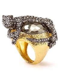 Animal influences play muse to this more-is-more cocktail ring, topped by a pyrite stone and crystal bedecked panther. By Alexis Bittar.