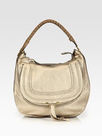 EXCLUSIVELY AT SAKS in Metallic Beige. A slouchy silhouette in frosted metallic calfskin leather, finished with a signature tennis-wrapped handle. Top handle, 8 dropTop zip closureHidden open pocket under flapOne inside zip pocketOne inside open pocketCotton lining15¾W X 15H X 5DMade in Italy