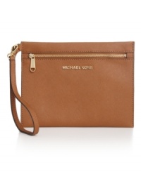 Store your stash in style with this little lovely from MICHAEL Michael Kors. Dressed in soft Saffiano leather with signature detailing, it keeps cash, cards, and other out-on-the-town essentials easily at hand.