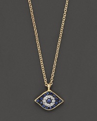 Adorn yourself with sparkling diamonds and sapphires set in a 14K yellow gold pendant inspired by ancient traditions.