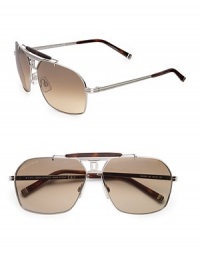 THE LOOKAviator style Metal framesLogo accented temples and end-pieces UVA and UVB protection Signature case includedTHE COLORShiny palladium with brown lensesORIGINMade in Italy