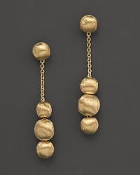 Stunning 18K gold spheres form gleaming drop earrings. From the Africa collection by Marco Bicego.