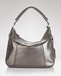 Unexpected details and a shoulder-right shape update a consummate classic with carry-it-all credentials. From Cole Haan.