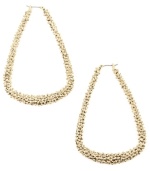 Textured appeal. RACHEL Rachel Roy's non-traditional hoop earrings feature a playful teardrop shape with a unique pebbled surface. Crafted in gold tone mixed metal. Approximate drop: 3 inches. Approximate diameter: 1-3/4 inches.