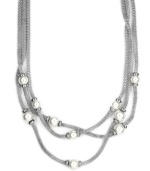 The look of loveliness. AK Anne Klein's chic, three-strand necklace showcases mesh details and imitation plastic pearls. Crafted in a imitation rhodium-tone mixed metal setting. Approximate length: 17-1/2 inches + 3-inch extender. Approximate drop: 1 inch.