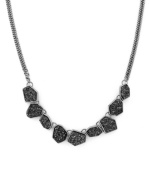 Rock solid. Chunky hematite drusy chips adorn this head-turning necklace from BCBGeneration. Setting and multi-chain design crafted in silver tone mixed metal. Approximate length: 18 inches.