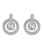 Come full circle: You'll wear Swarovski's double circle crystal stud earrings again and again--whether to dress up a daytime look or enhance your evening attire. Crafted in silver tone mixed metal. Approximate diameter: 1 inch.