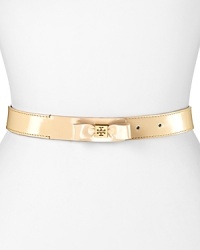 Tory Burch contours your look this season with this glossy patent leather belt, detailed with a polished bow.