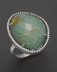 Diamonds circle a faceted rutilated quartz and green amazonite doublet in a sterling silver band. By Di Massima.