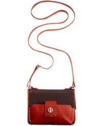 For the tech-savvy girl on-the-go, this essential essential crossbody from Giani Bernini features soft saffiano leather in cool colorblocking. Discrete signature hardware adds a touch of discerning detail, while the interior easily stows your tech toy, cash, cards and ID.