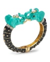 Just zoo it with this bejeweled elephant bangle from Juicy Couture - done in black and gold plate with crystal accents. It's a cute way to pique animal instincts.