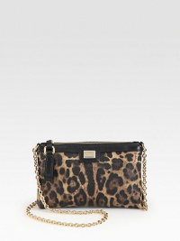 A bold leopard-print characterizes this mini crossbody with a gleaming chain strap. Chain shoulder strap, 50 dropTop zip closureOne inside open pocketFully lined8W X 5H X 1DMade in Italy