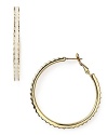 kate spade new york's ridged enamel and gold-plated hoops will make a bold addition to your jewel box. Slip them in to dress up denim or round out a cocktail look.