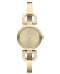 DKNY takes a ladylike turn with this golden bangle watch.