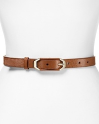 Cole Haan contours your look this season with a simply styled leather belt, which closes with an end-bar buckle.